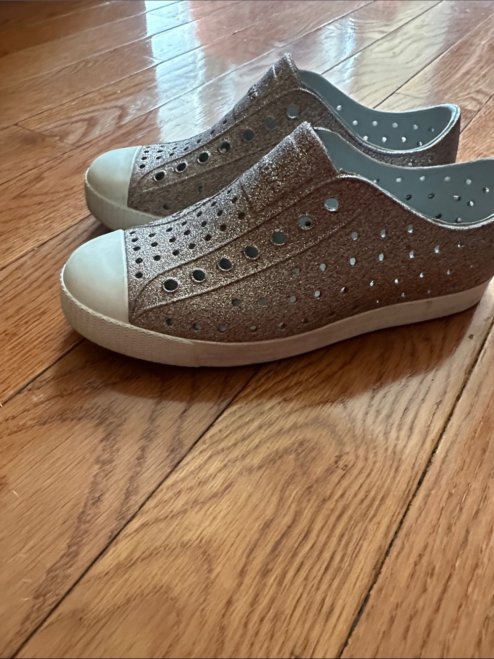 Native Shoes Kids Slip-On Sneakers in Gold/ Bronze Glitter